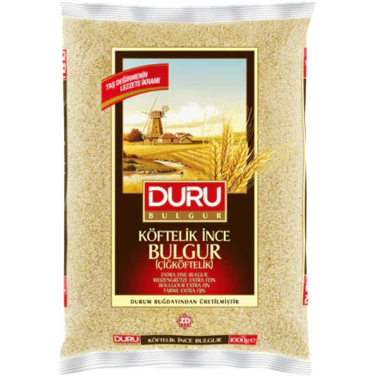 Sachet de boulgour fin Duru dans emballage jaune transparent laissant voir les grains de blé dorés